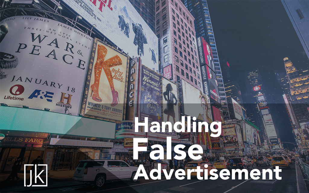 buildings in city with lots of advertisement billboards for Jahan Kalantar motivational speaker tips for handling false advertisement